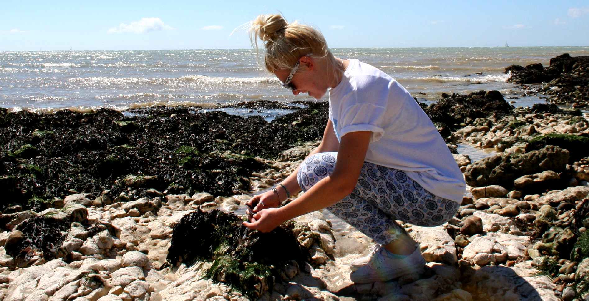Emily Hoad, marine biologist on the beach at Seaford Head