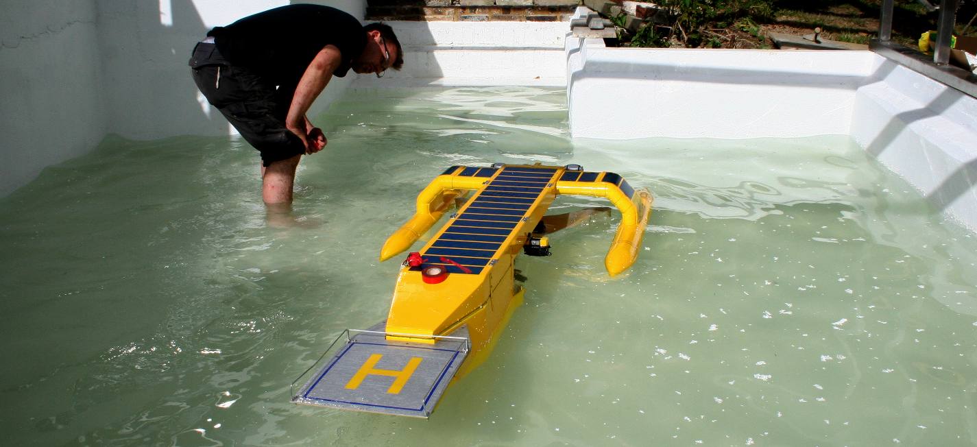 Project director, Chris Close in a test tank with the SeaVax prototype